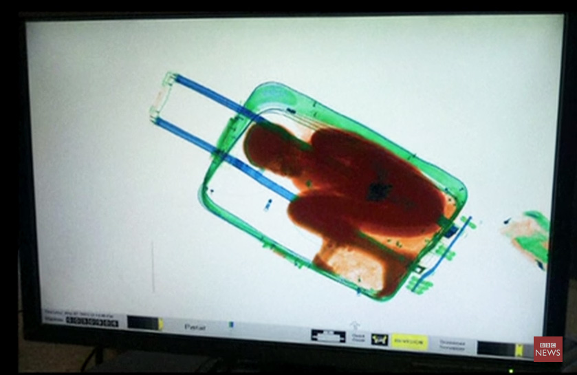 'Suitcase boy' reunited with mother