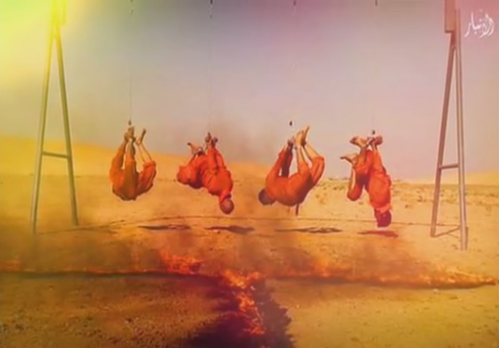 IS가 포로들을 화형시키는 장면 