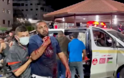 이스라엘 공군의 폭격으로 부상당한 사람이 병원으로 이송되고 있다. 